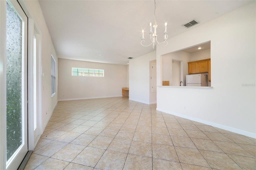 7740 Linkside Loop Reunion, FL 34747 - Photo 5 of 34 a view of an empty room and window