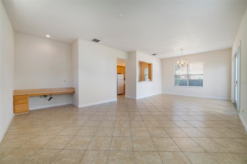 7740 Linkside Loop Reunion, FL 34747 - Photo 7 of 34 an empty room with a natural light