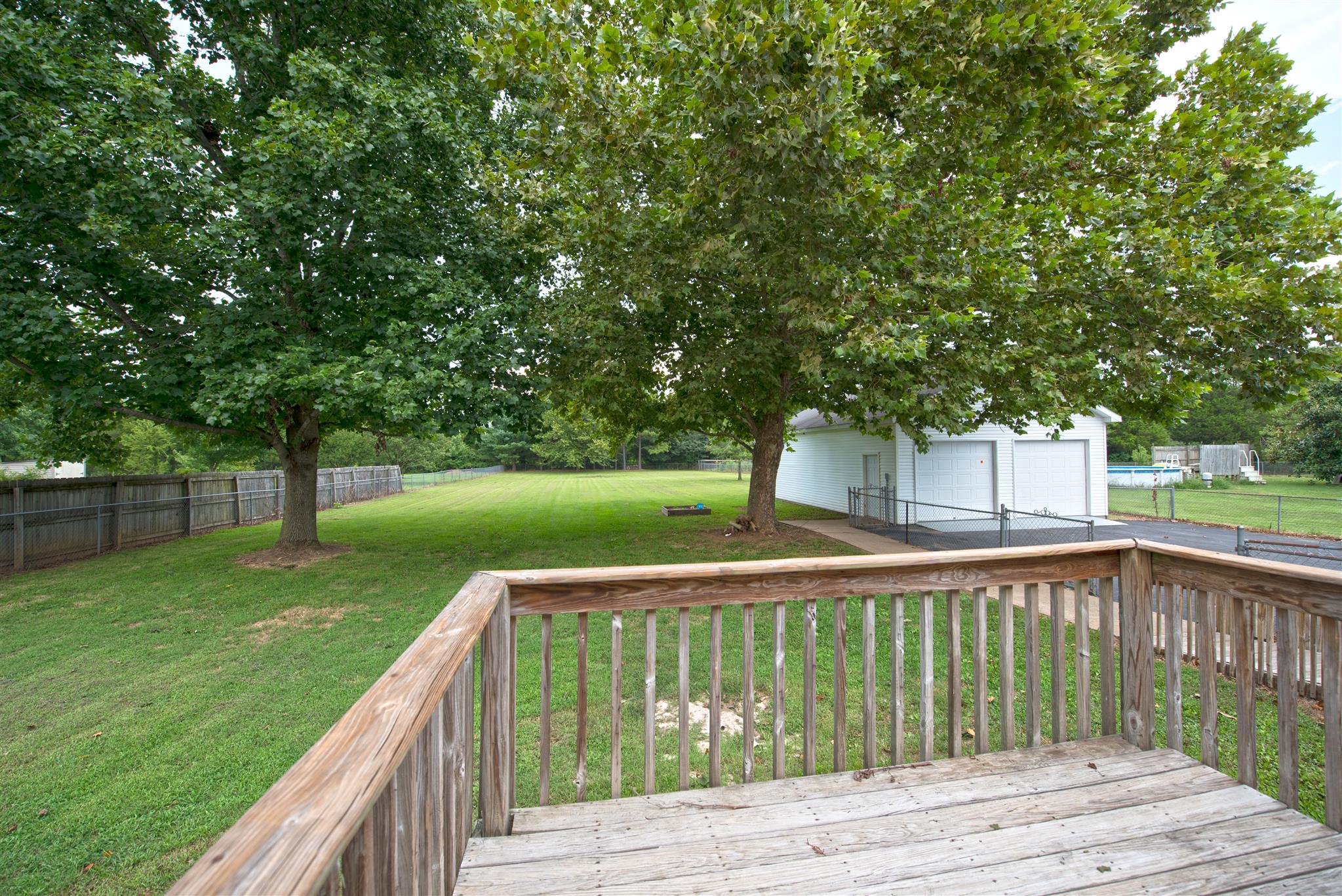 7500 Joe Rowlin Road Christiana, TN 37037 - Photo 20 of 22 a view of deck with a large trees