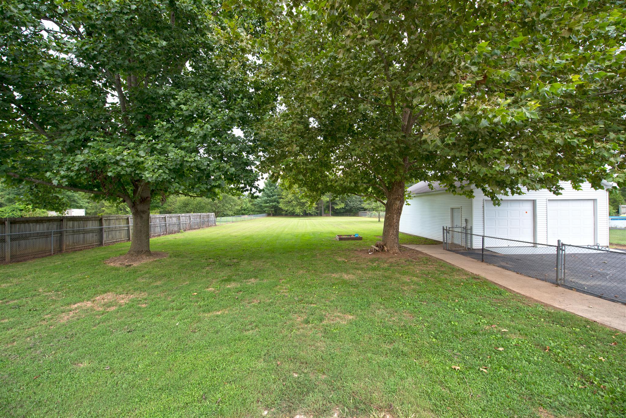 7500 Joe Rowlin Road Christiana, TN 37037 - Photo 21 of 22 a view of a house with a backyard