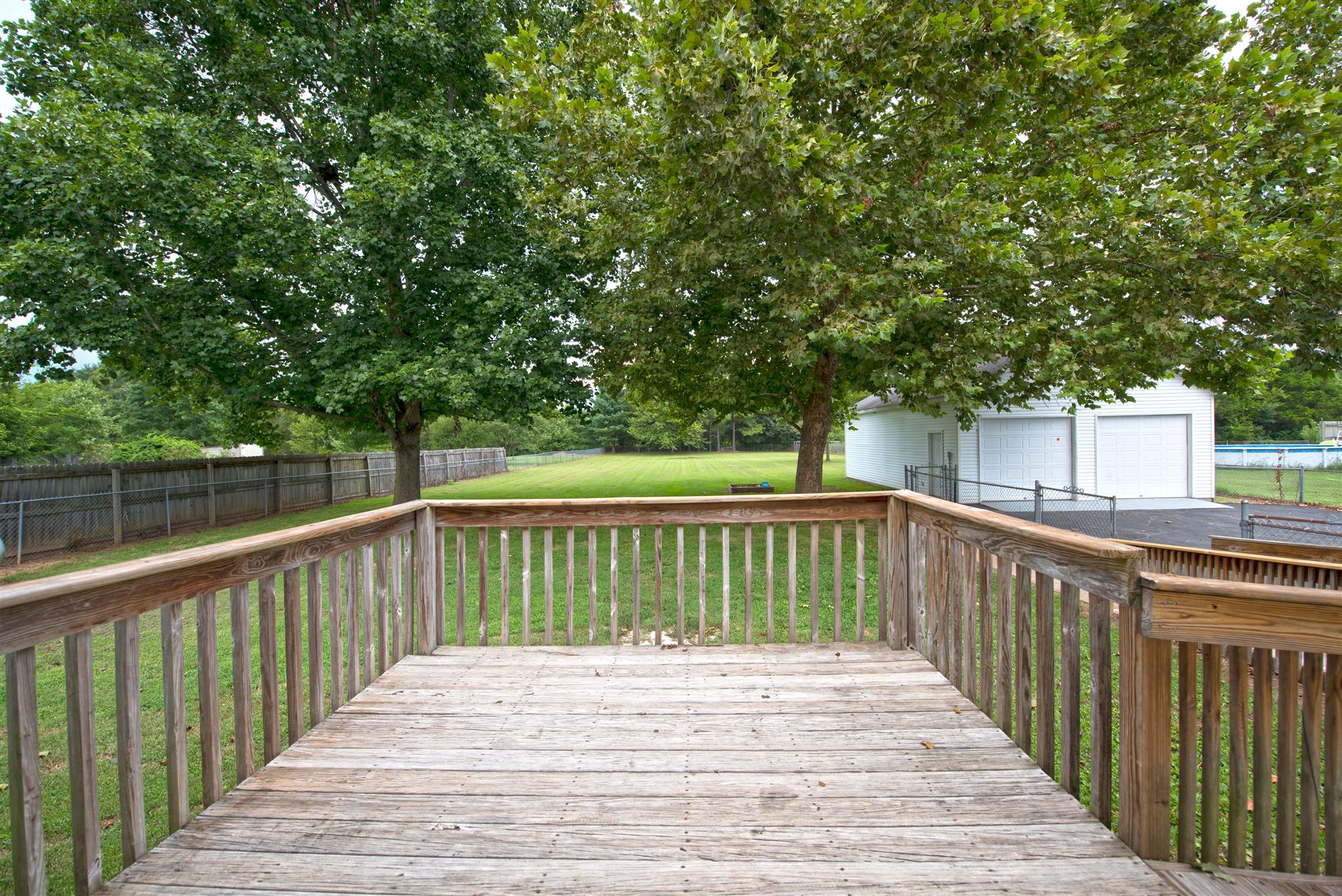 7500 Joe Rowlin Road Christiana, TN 37037 - Photo 22 of 22 a view of deck with wooden floor and fence