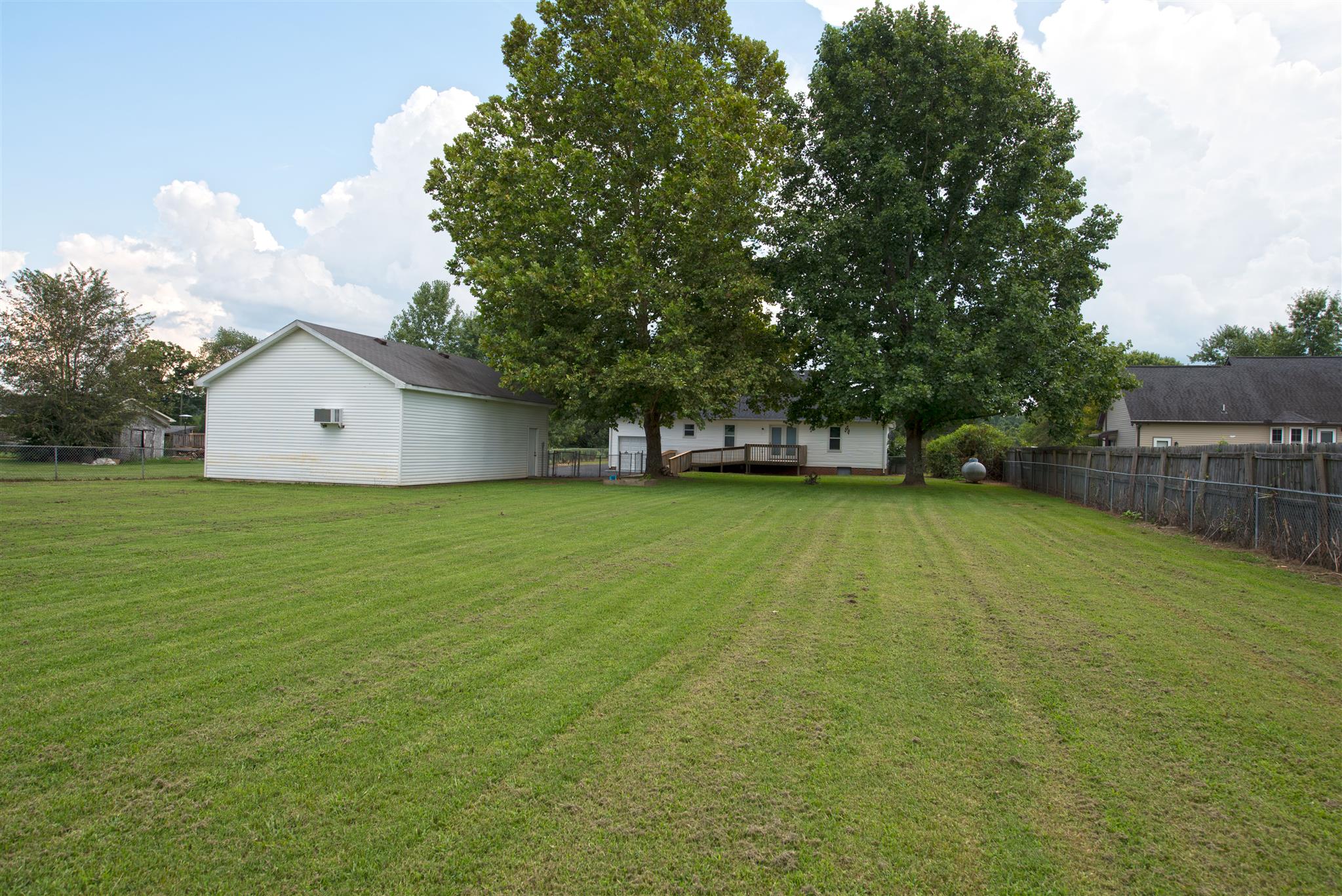 7500 Joe Rowlin Road Christiana, TN 37037 - Photo 7 of 22 a house view with swimming pool in front of it