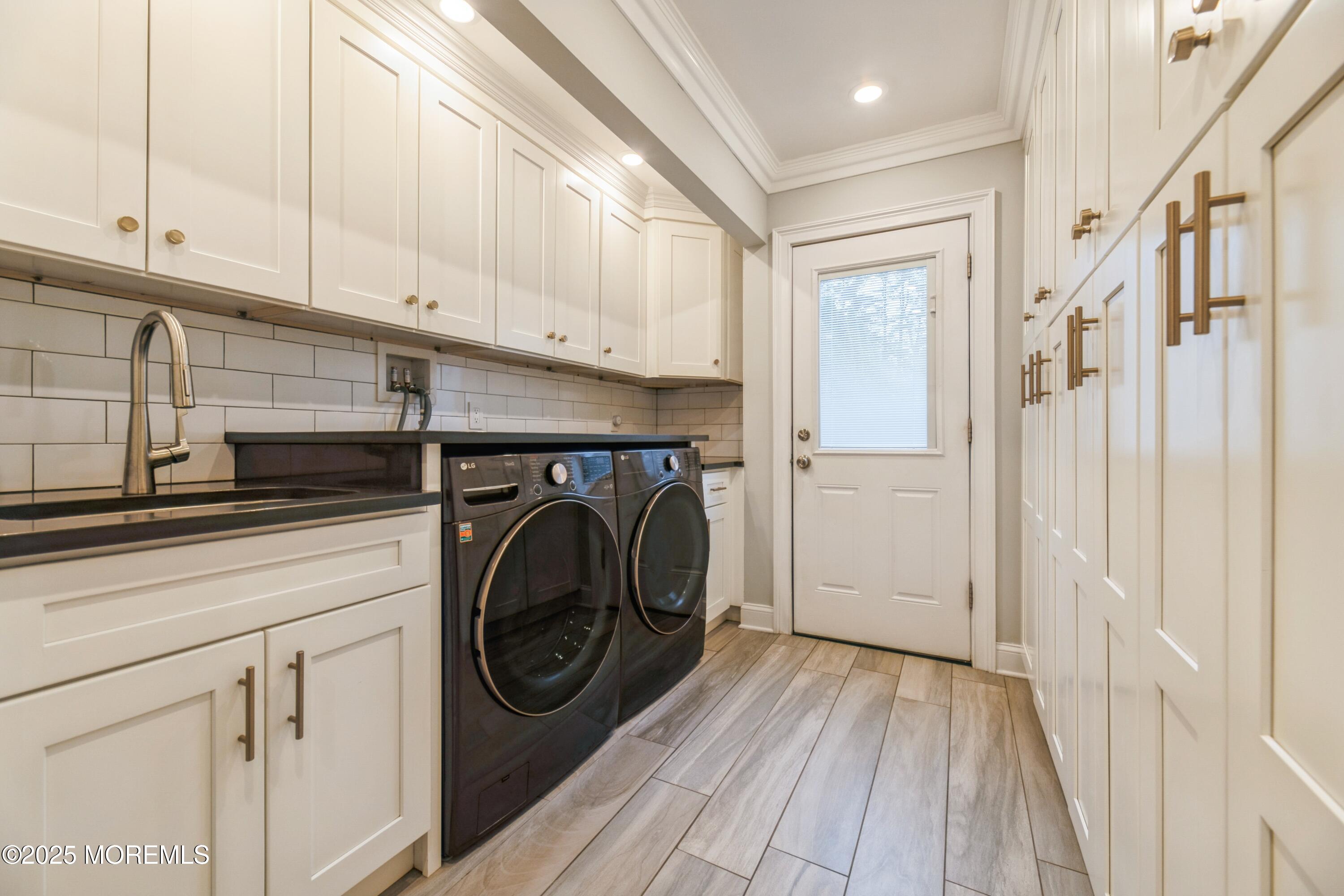 44 Manor Drive Marlboro, NJ 07746 - Photo 11 of 26 a view of a kitchen with washer and dryer