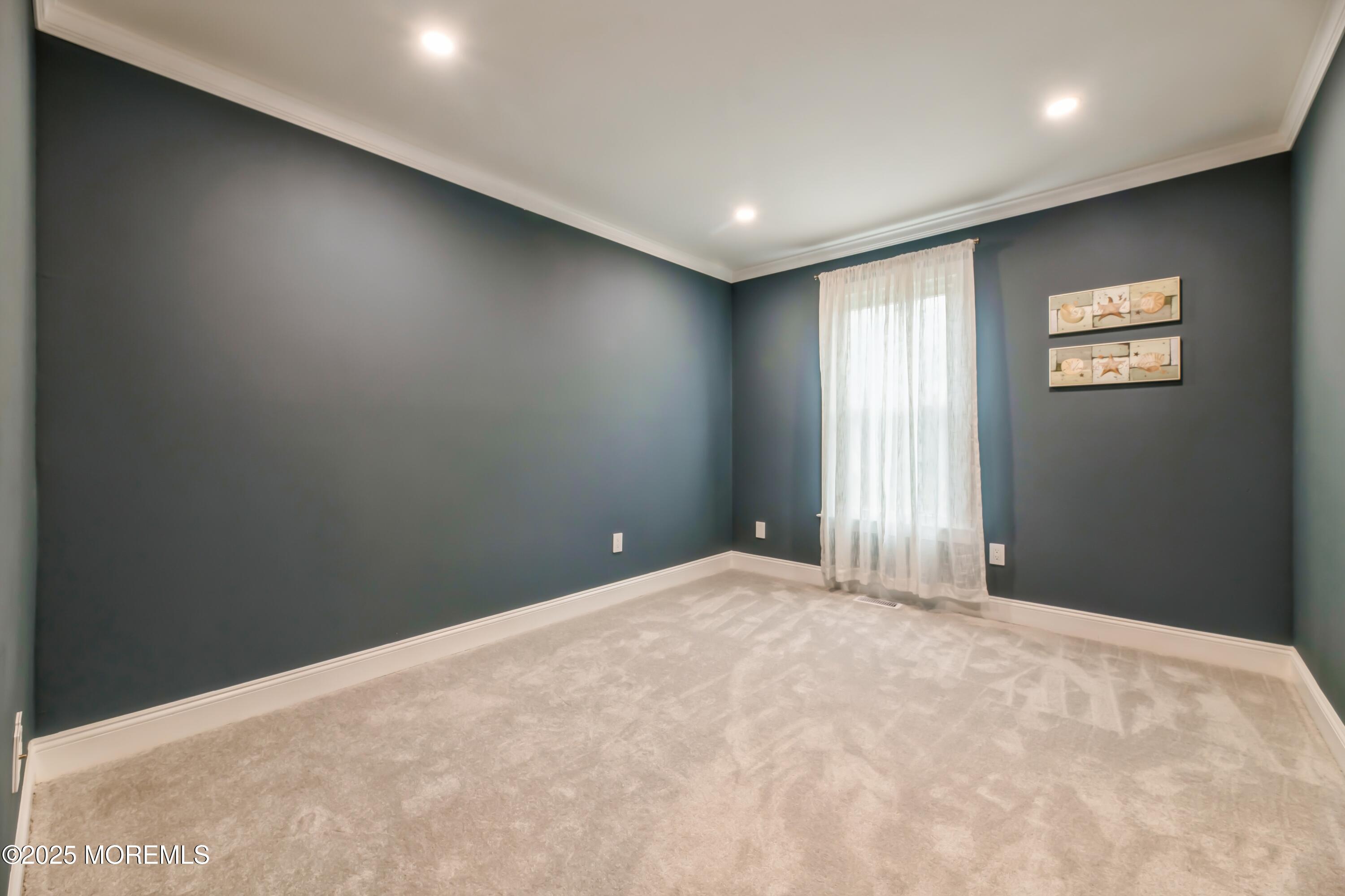 44 Manor Drive Marlboro, NJ 07746 - Photo 19 of 26 a view of an empty room with a window