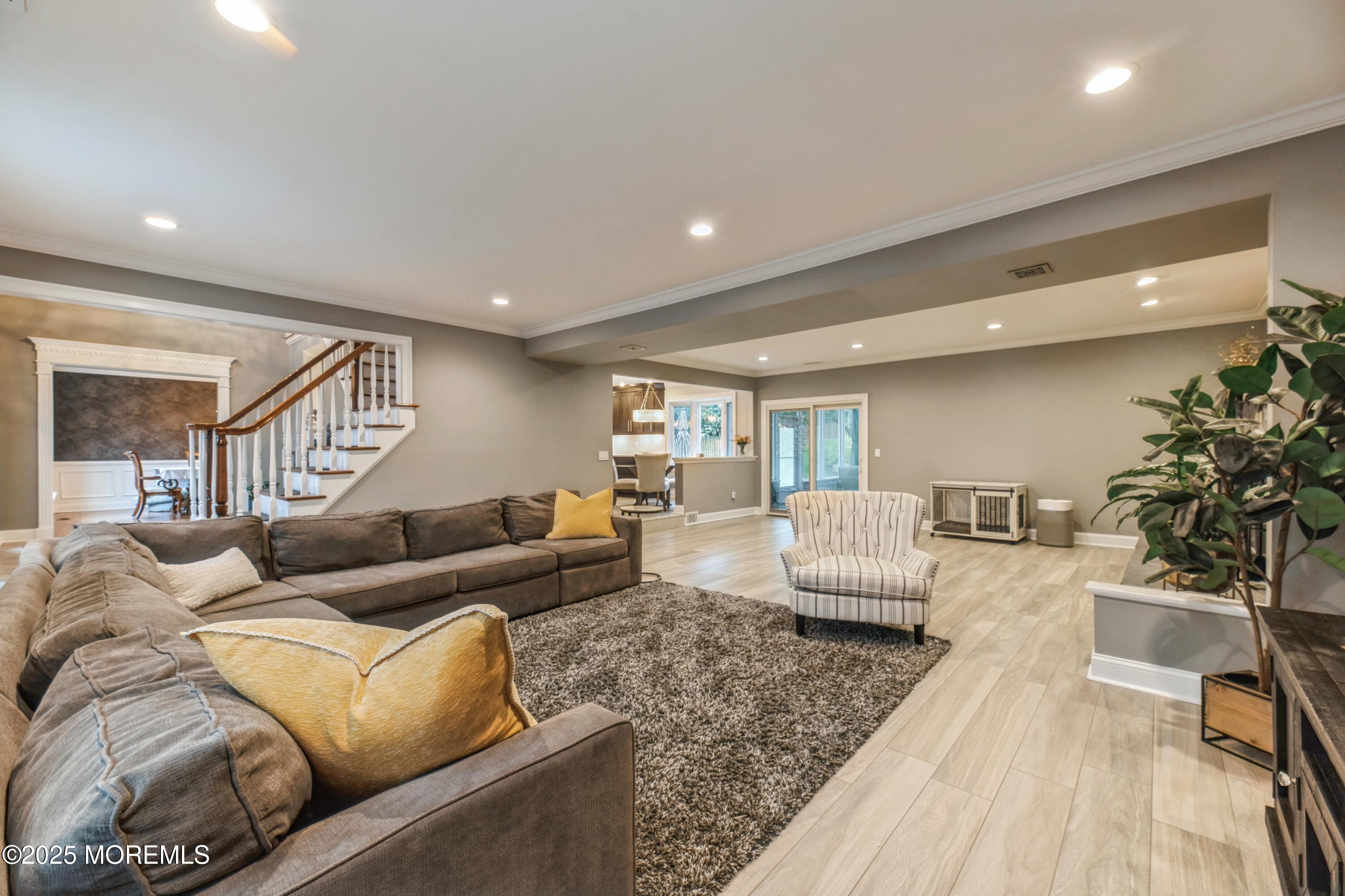 44 Manor Drive Marlboro, NJ 07746 - Photo 4 of 26 a living room with furniture and a couch