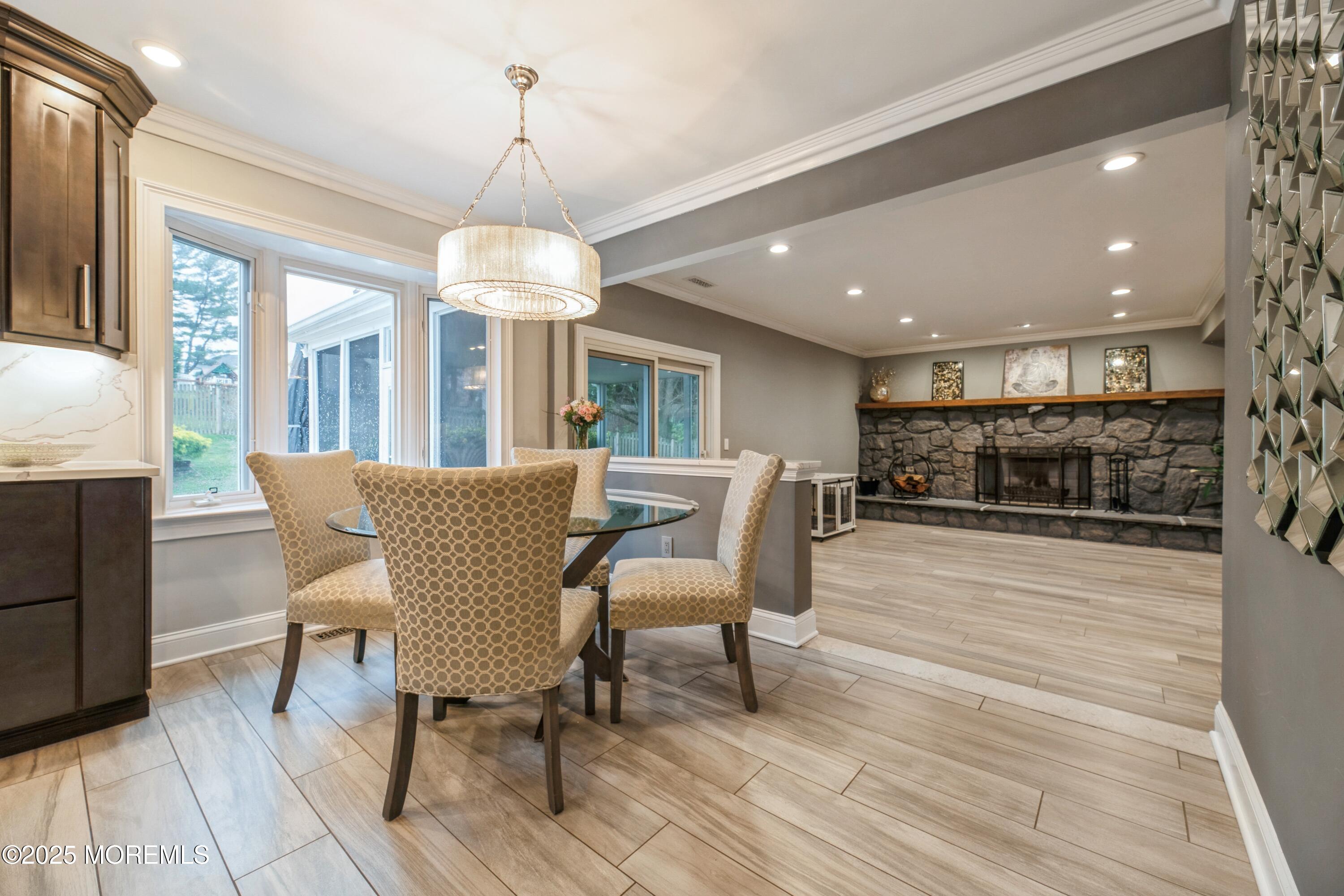 44 Manor Drive Marlboro, NJ 07746 - Photo 6 of 26 a dining room with furniture and wooden floor
