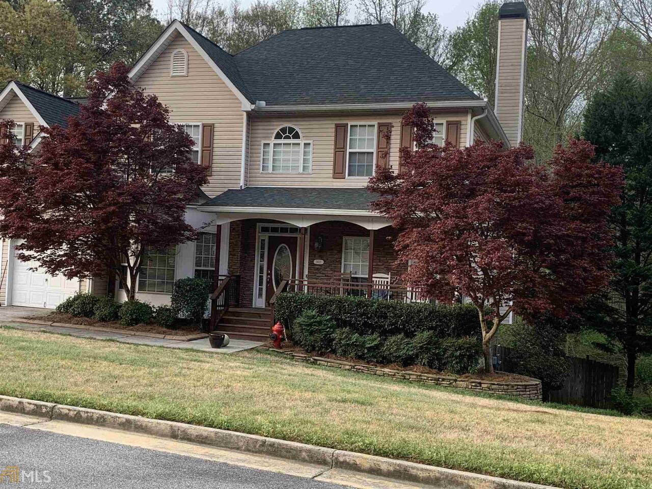 3621 Sunset Ridge, Unit L Powder Springs, GA 30127 - Photo 1 of 1 a front view of a house with garden
