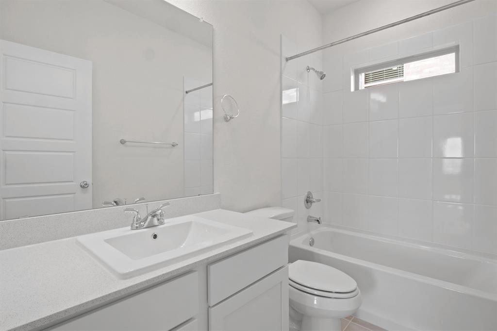 128 Millwood Road Lavon, TX 75166 - Photo 15 of 17 Bathroom in the Pecan II home plan by Trophy Signature Homes – REPRESENTATIVE PHOTO