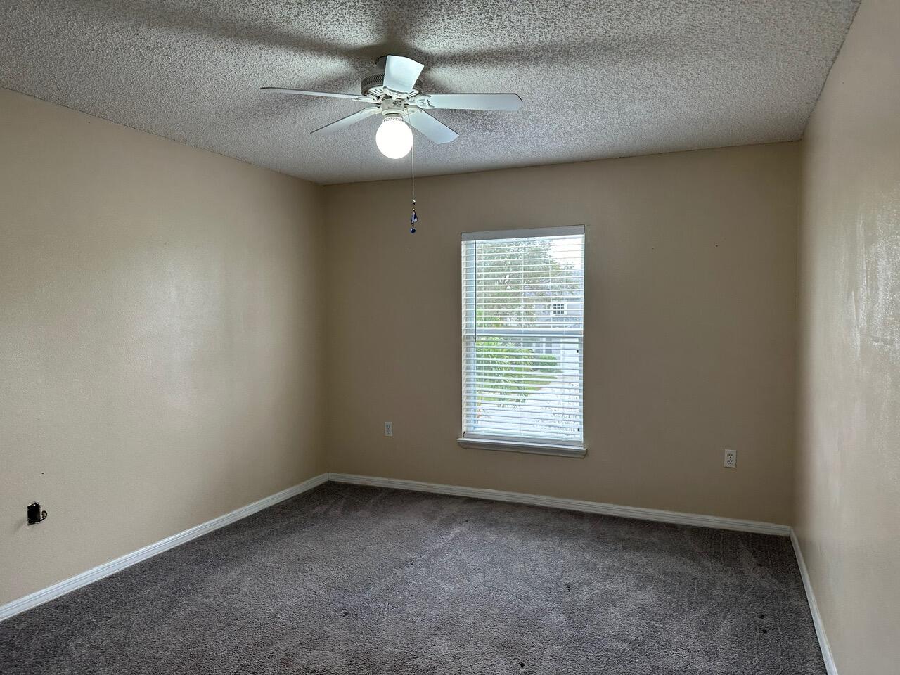 3844 La Flor Drive Rockledge, FL 32955 - Photo 13 of 32 an empty room with a window