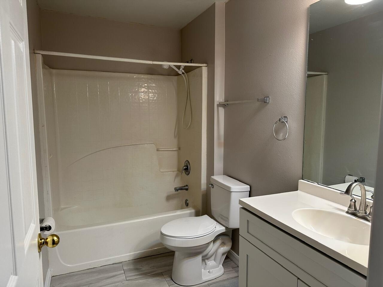 3844 La Flor Drive Rockledge, FL 32955 - Photo 19 of 32 a bathroom with a sink toilet and shower