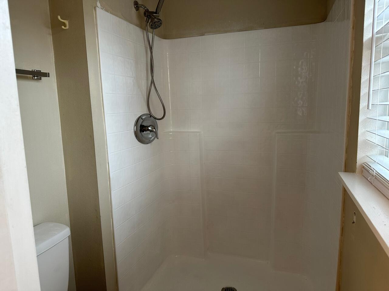 3844 La Flor Drive Rockledge, FL 32955 - Photo 23 of 32 a bathroom with a shower