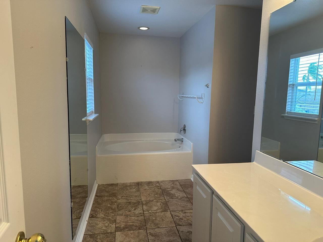 3844 La Flor Drive Rockledge, FL 32955 - Photo 24 of 32 a bathroom with a bathtub and a shower