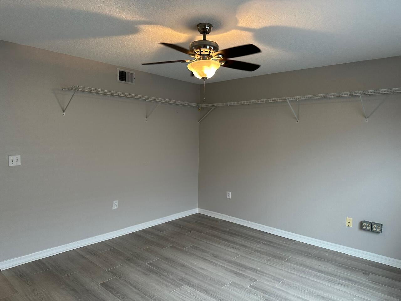 3844 La Flor Drive Rockledge, FL 32955 - Photo 8 of 32 a view of empty room with wooden floor
