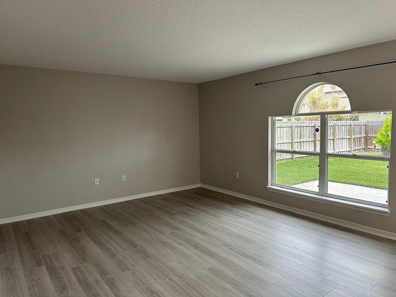 3844 La Flor Drive Rockledge, FL 32955 - Photo 9 of 32 a view of an empty room with a window