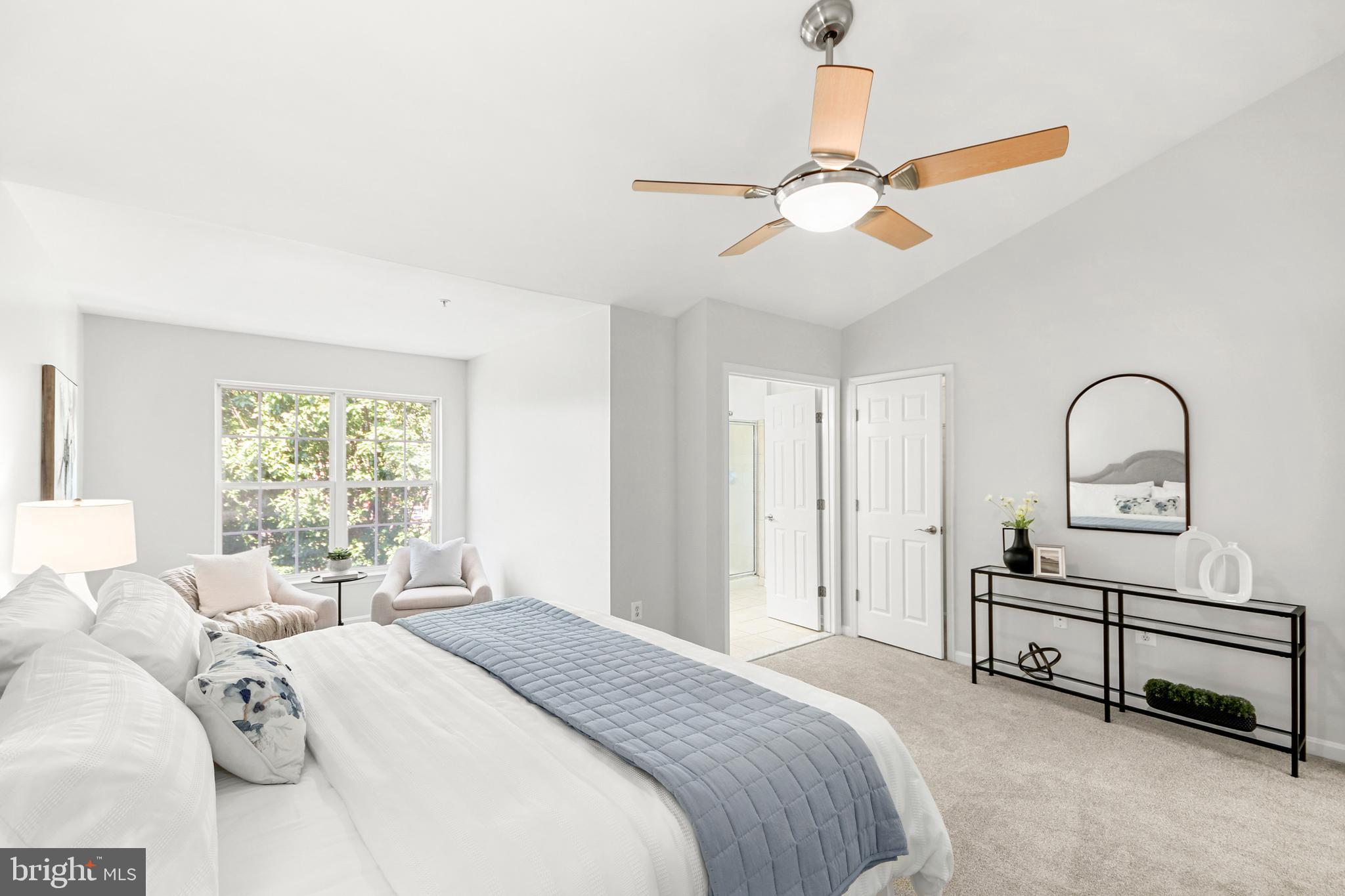 6577 Duncan Place Frederick, MD 21703 - Photo 9 of 10 a spacious bedroom with a bed and a window