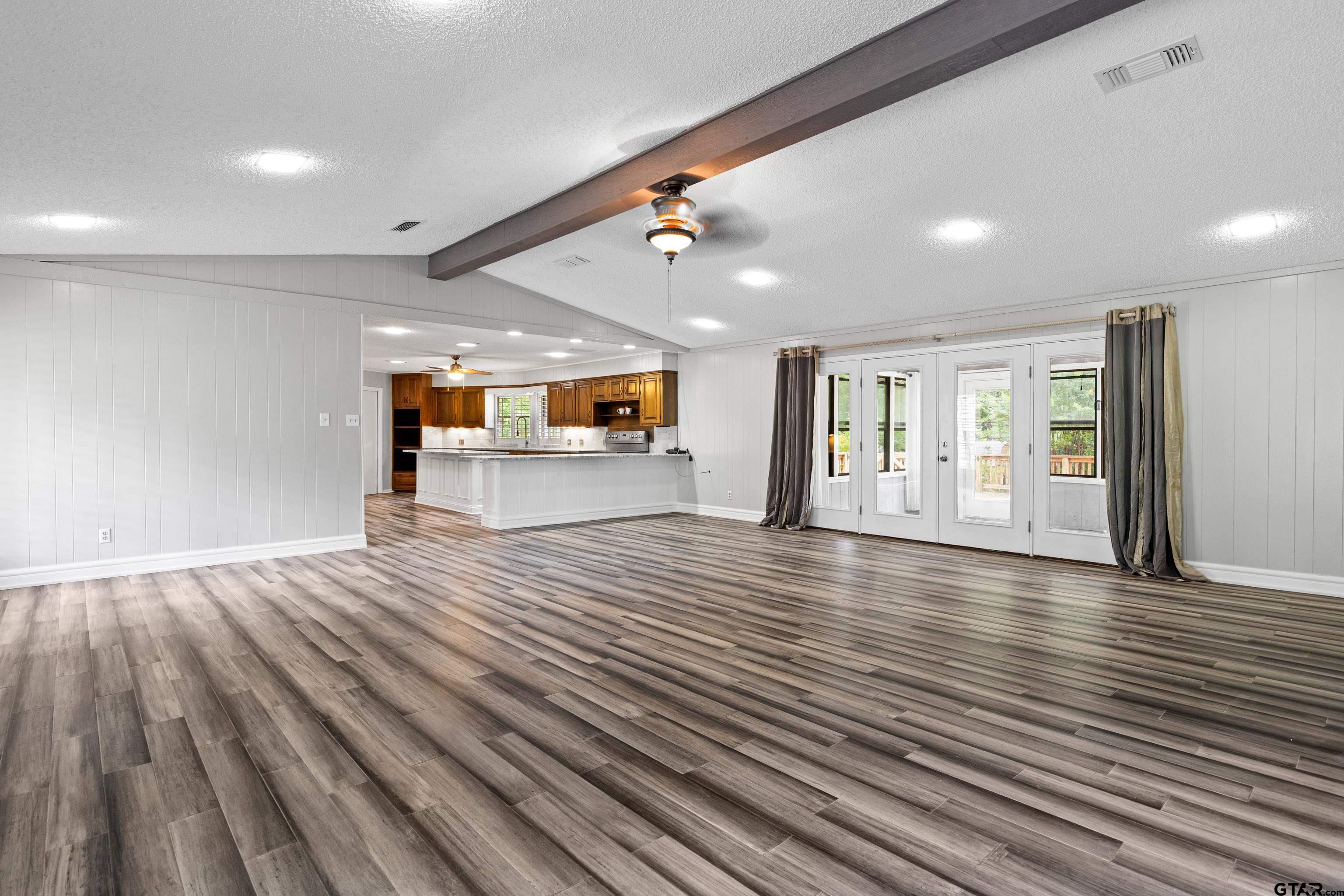 1821 Azalea Street Gilmer, TX 75644 - Photo 5 of 34 a view of a room with wooden floor