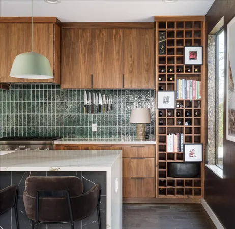 a kitchen with stainless steel appliances a refrigerator and stove