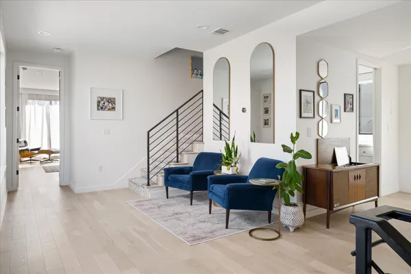 a bed room with a bed and a large window