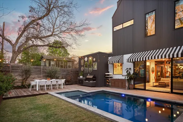a view of a house with a swimming pool