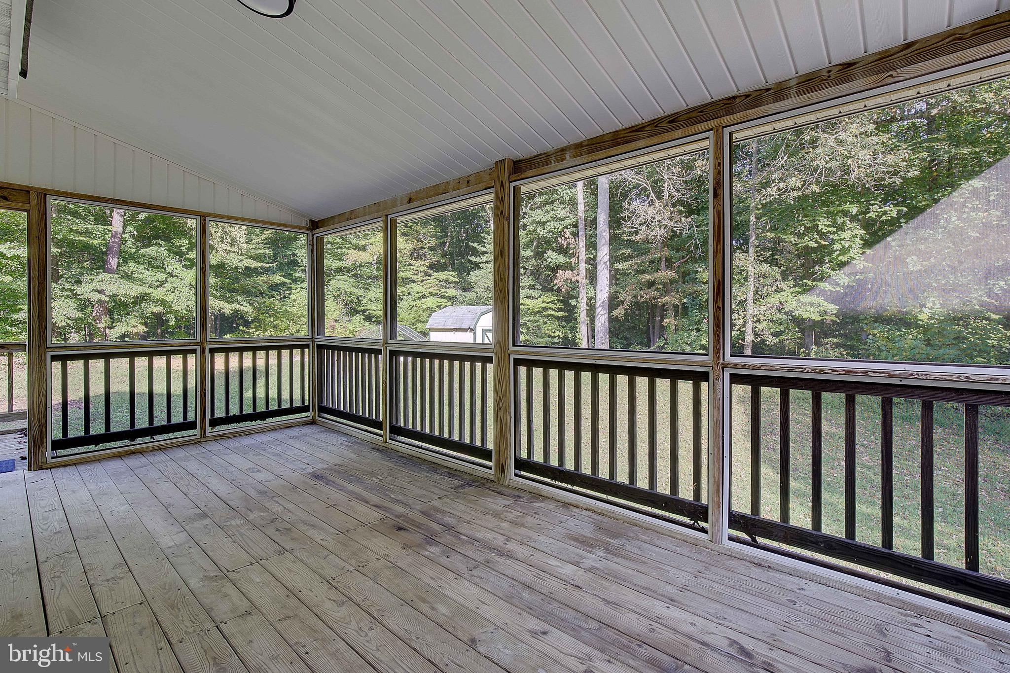 721 Small Reward Road Huntingtown, MD 20639 - Photo 25 of 51 a view of a balcony with wooden floor