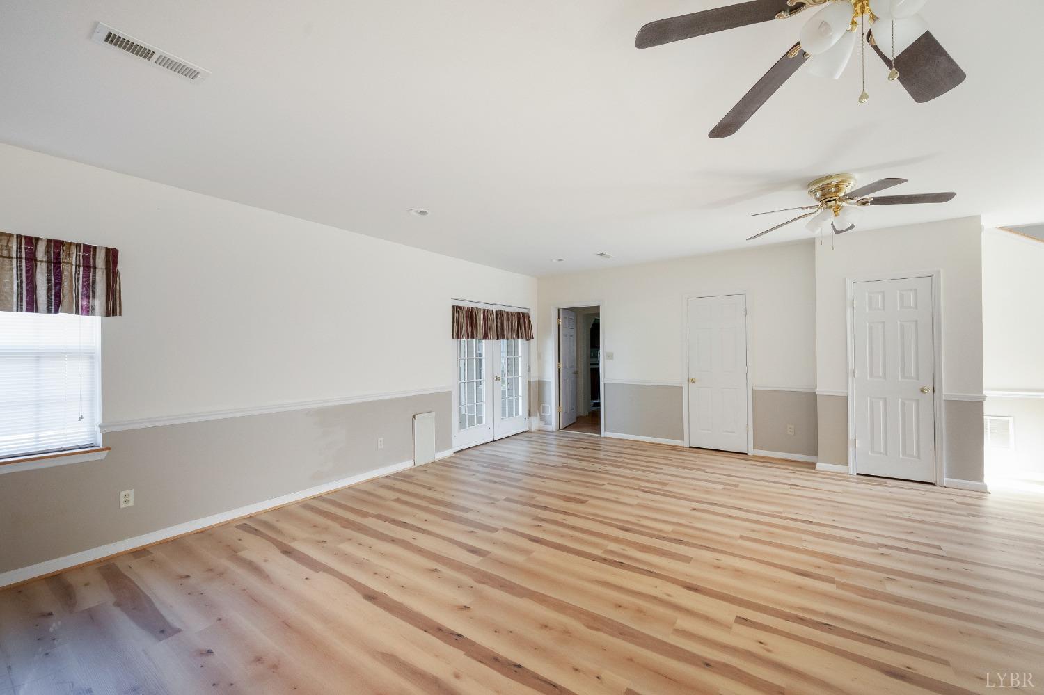 29 Dunivan Drive Rustburg, VA 24588 - Photo 16 of 61 a view of empty room with wooden floor