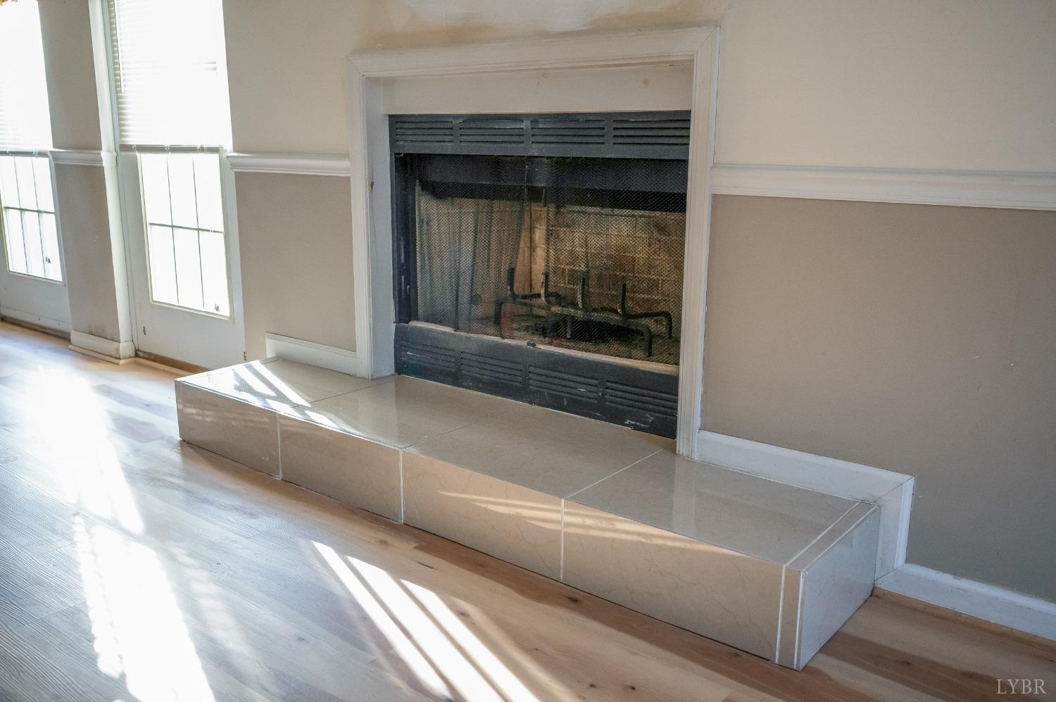 29 Dunivan Drive Rustburg, VA 24588 - Photo 27 of 61 a living room with a couch and a fireplace