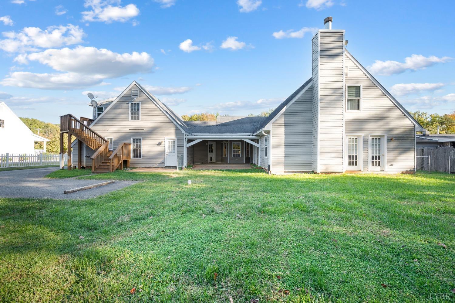 29 Dunivan Drive Rustburg, VA 24588 - Photo 6 of 61 a view of a house with a back yard