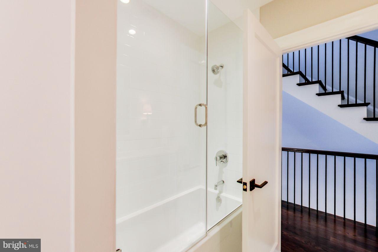 329 9th Street Northeast, Unit TH2 Washington, DC 20002 - Photo 18 of 29 Glass Shower and Tub