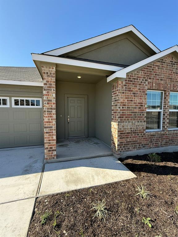 263 Magalia Lane Kyle, TX 78640 - Photo 2 of 37 a view of a house with a small backyard
