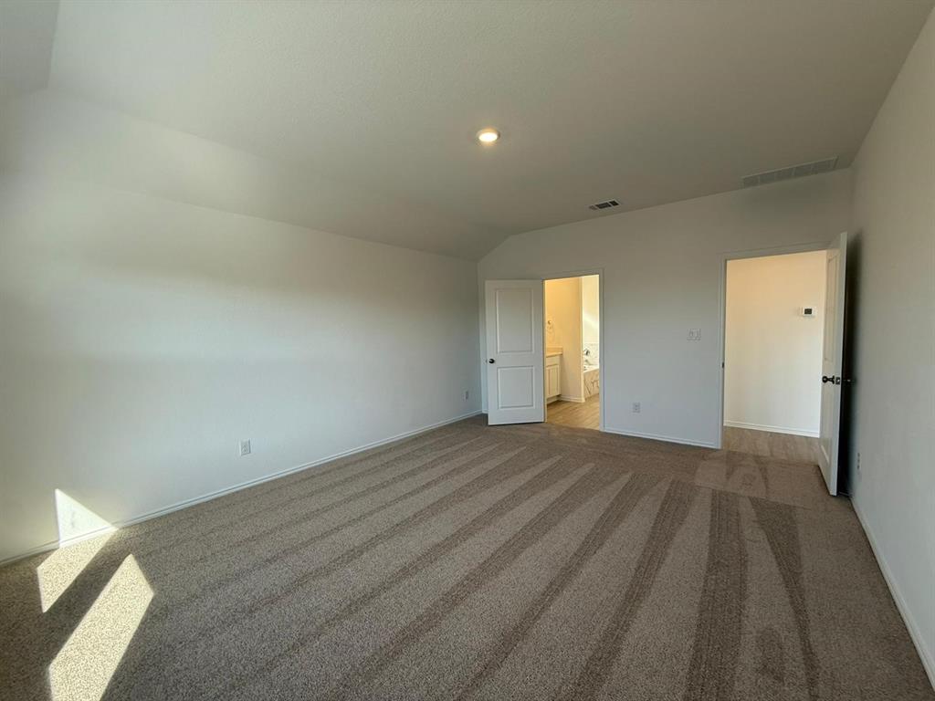 263 Magalia Lane Kyle, TX 78640 - Photo 25 of 37 a view of an empty room and window