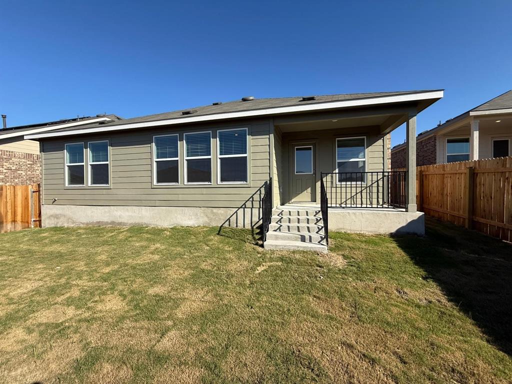263 Magalia Lane Kyle, TX 78640 - Photo 30 of 37 a house view with a garden space