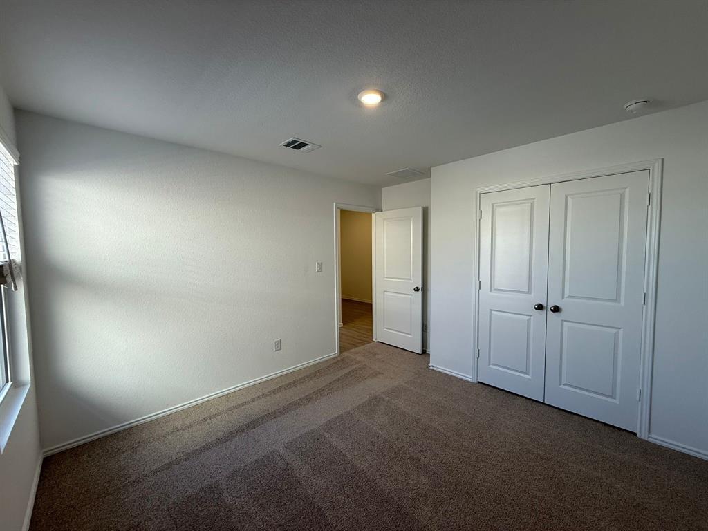 263 Magalia Lane Kyle, TX 78640 - Photo 10 of 37 a view of an empty room