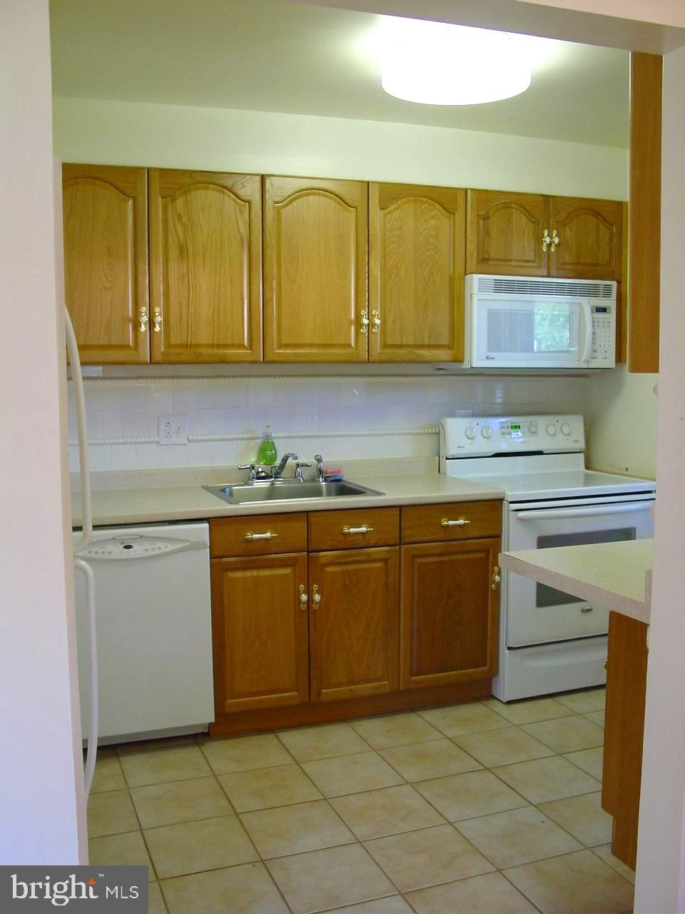 9303 Hood Road Manassas, VA 20110 - Photo 3 of 15 Older kitchen picture taken from property manager