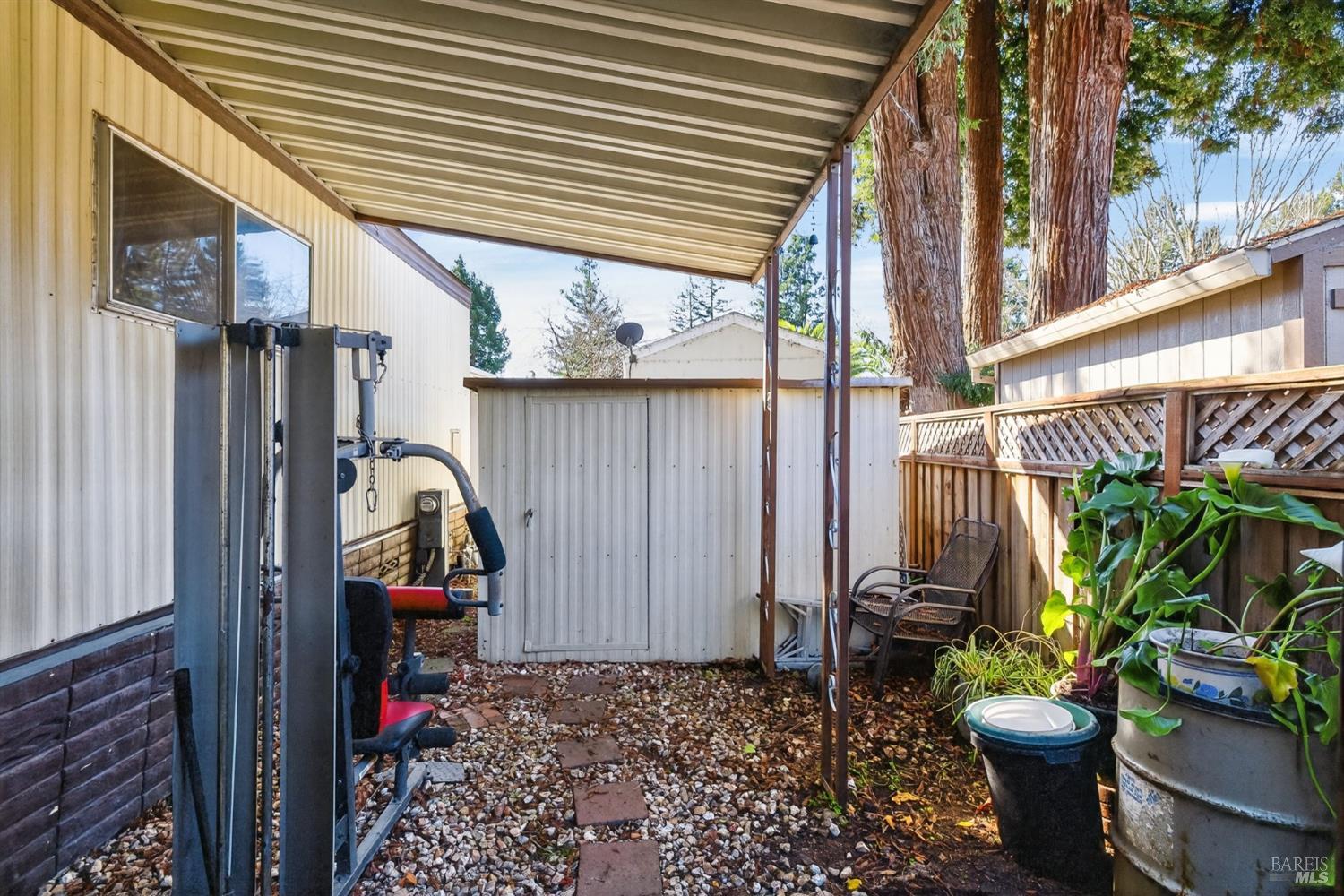 902 Corte Amarillo Rohnert Park, CA 94928 - Photo 26 of 31 a view of a porch with furniture and a potted plant