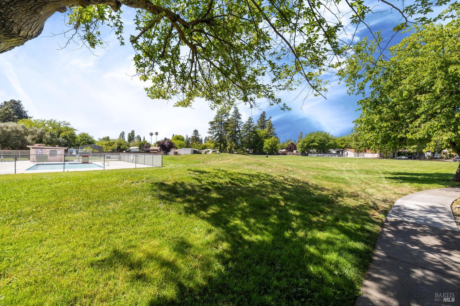 902 Corte Amarillo Rohnert Park, CA 94928 - Photo 29 of 31 a view of a golf course with a lake