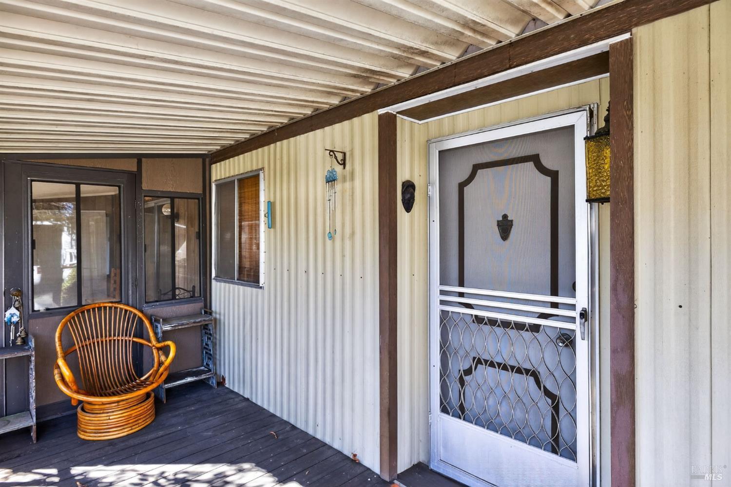 902 Corte Amarillo Rohnert Park, CA 94928 - Photo 6 of 31 a front view of a house with swing and furniture