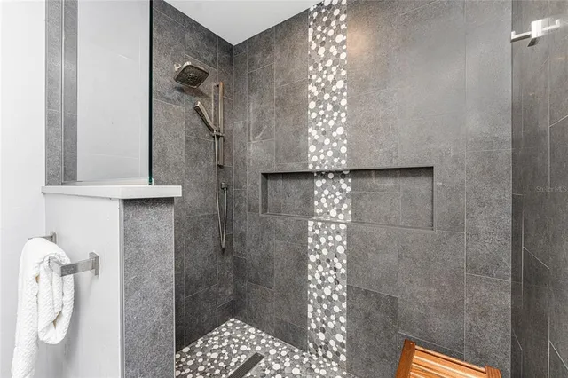 a view of swimming pool with lounge chair