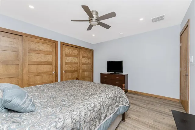 a view of a patio with a table and chairs