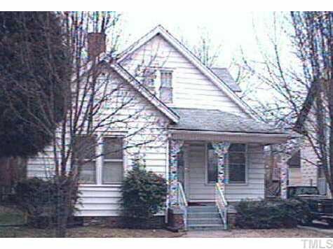 1111 South Person Street Raleigh, NC 27601 - Photo 1 of 1 front view of house with a yard
