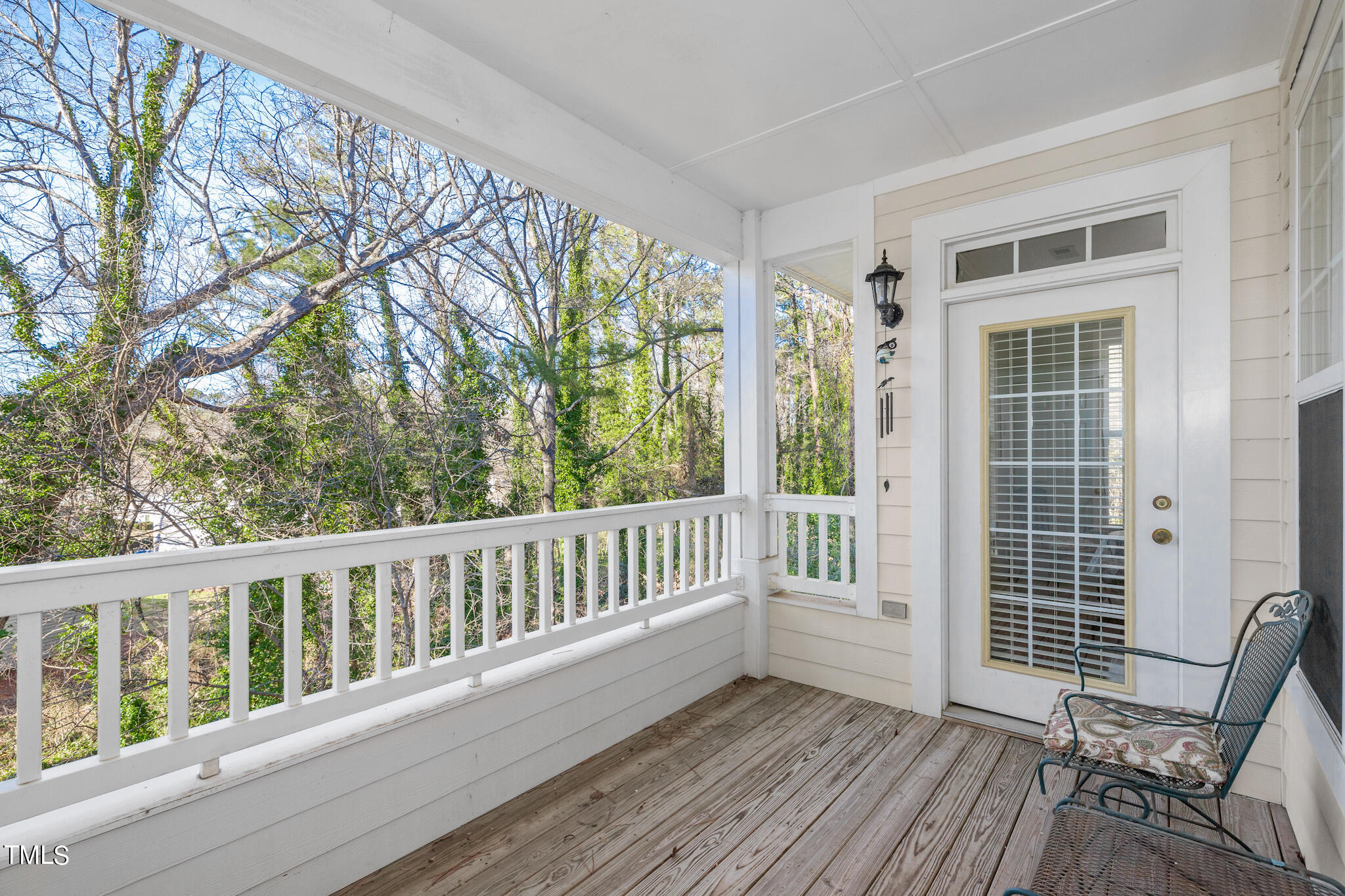 1700 Tiffany Bay Court, Unit 303 Raleigh, NC 27609 - Photo 18 of 30 a view of a deck with wooden floor and fence