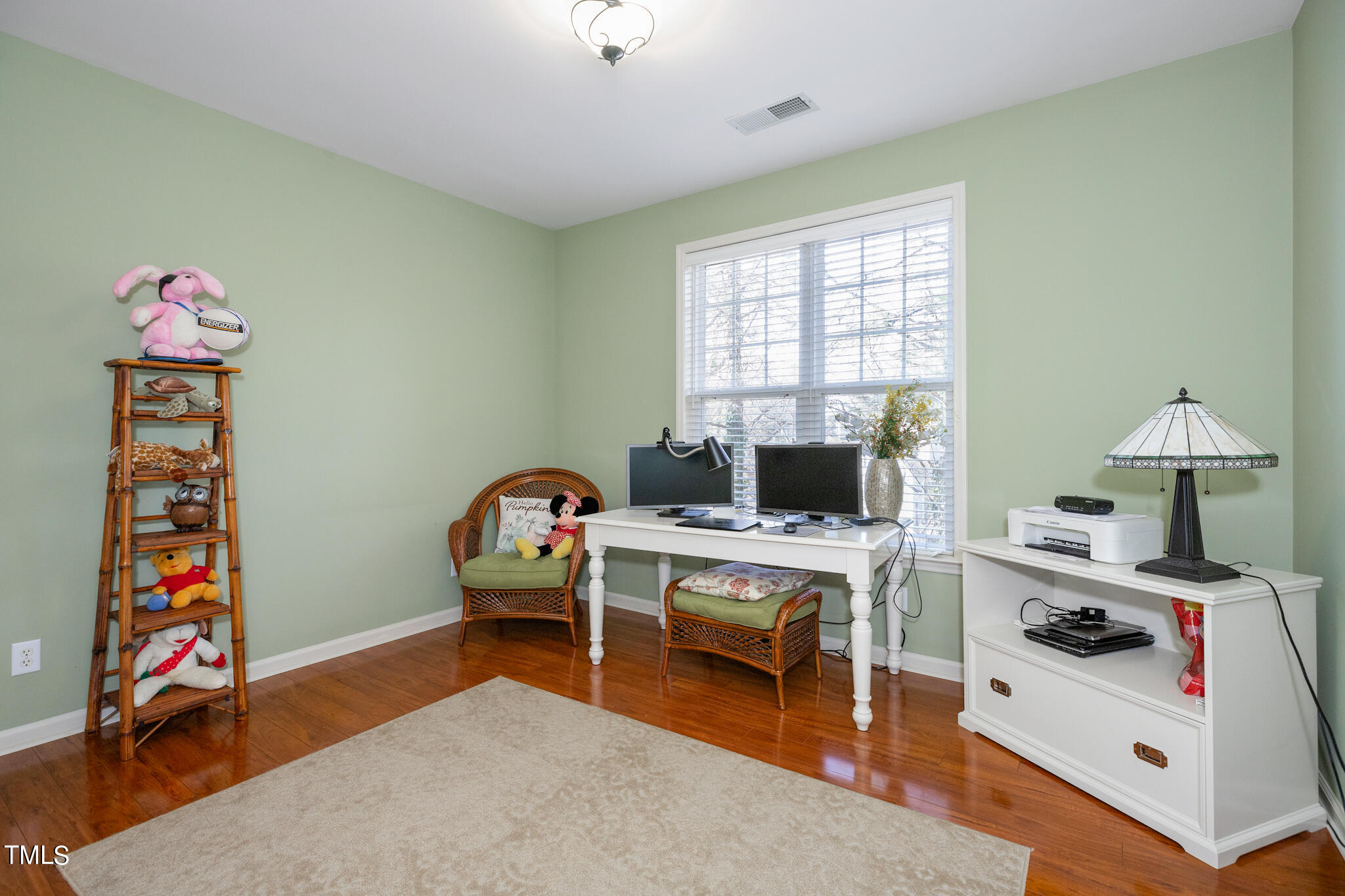 1700 Tiffany Bay Court, Unit 303 Raleigh, NC 27609 - Photo 19 of 30 a living room with furniture and a window