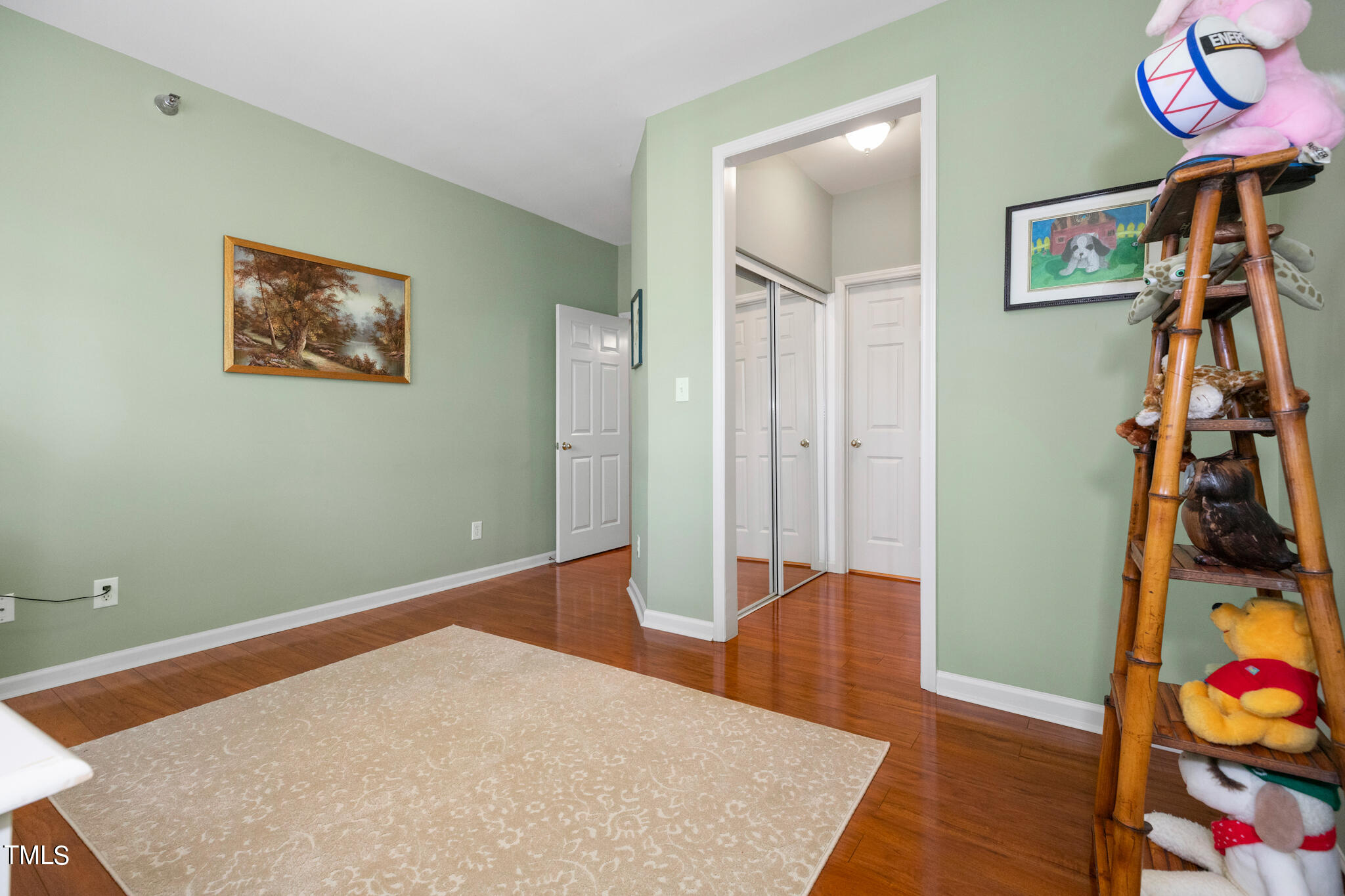 1700 Tiffany Bay Court, Unit 303 Raleigh, NC 27609 - Photo 20 of 30 a view of an entryway with wooden floor