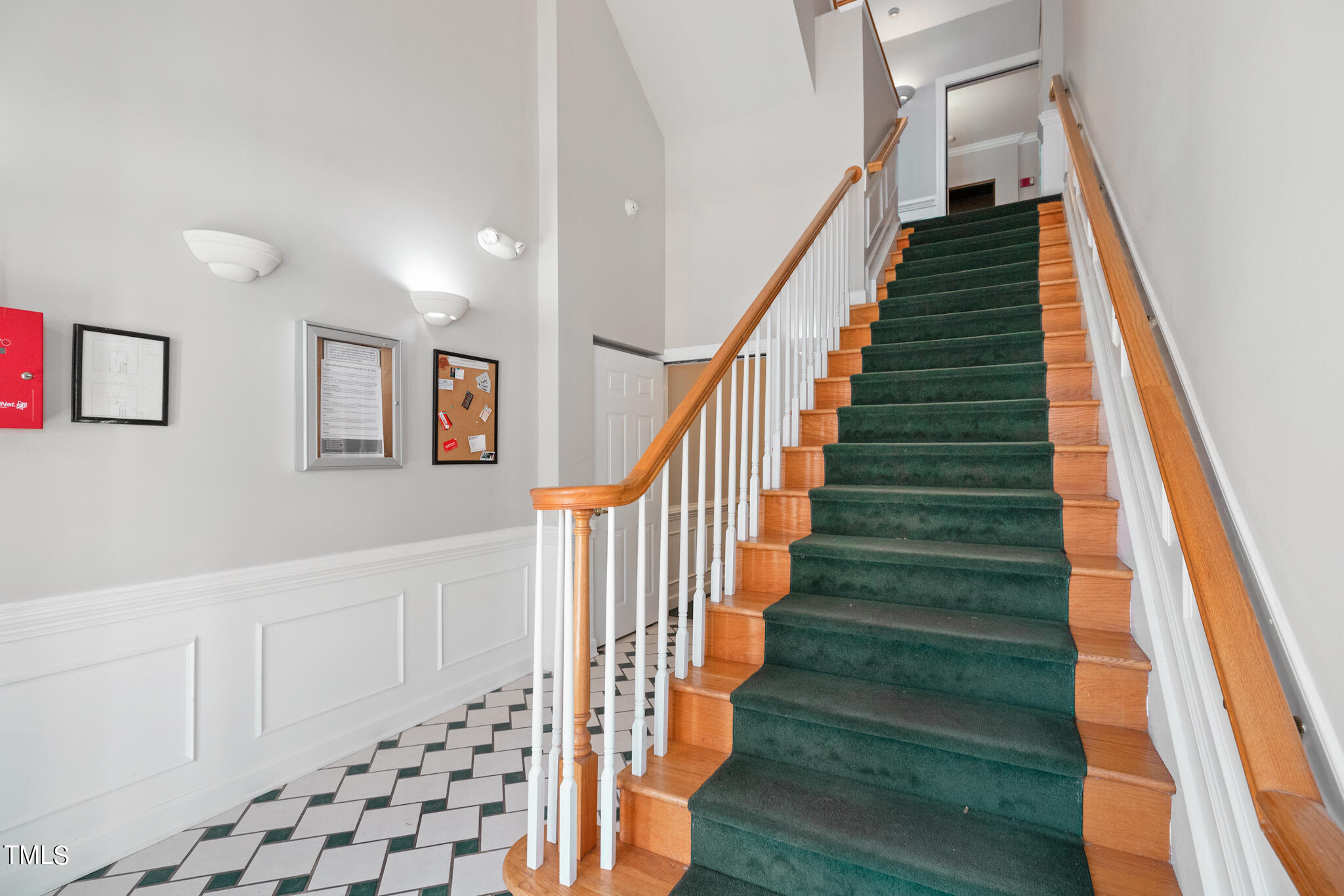 1700 Tiffany Bay Court, Unit 303 Raleigh, NC 27609 - Photo 5 of 30 a view of entryway and hall with wooden floor