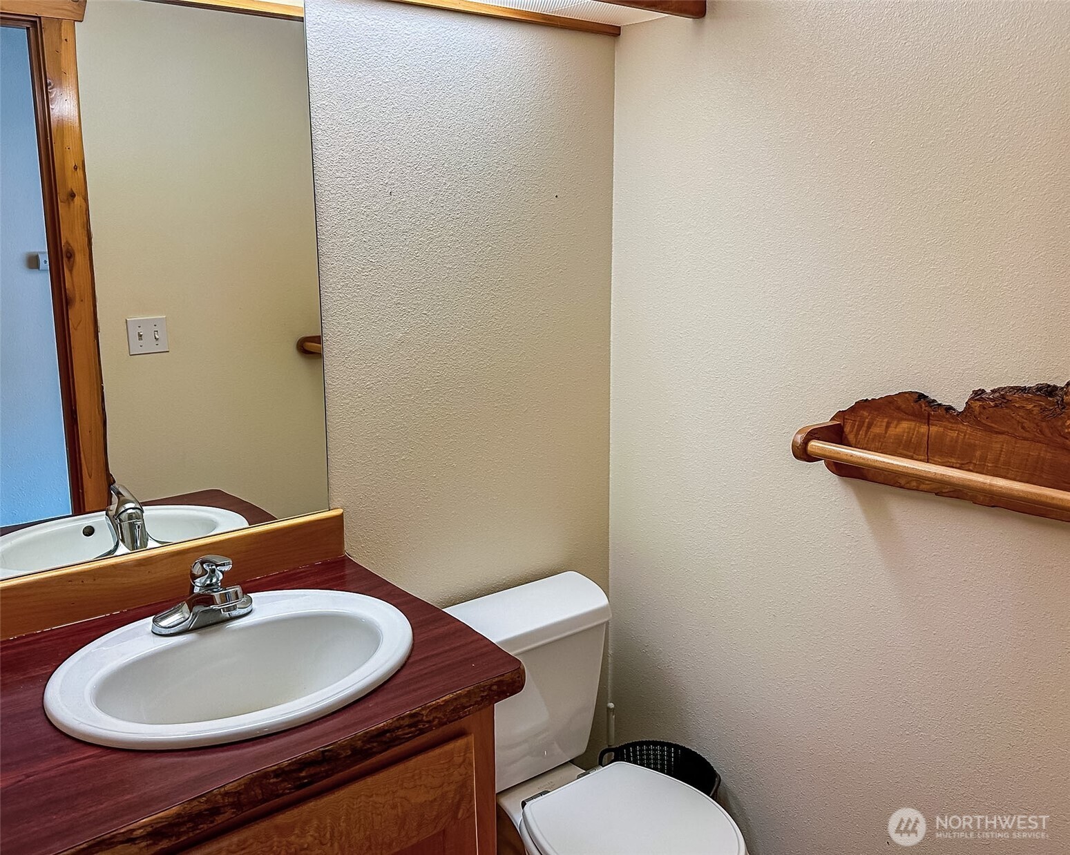 132 Findley Road Morton, WA 98356 - Photo 14 of 28 a bathroom with a toilet a sink and mirror