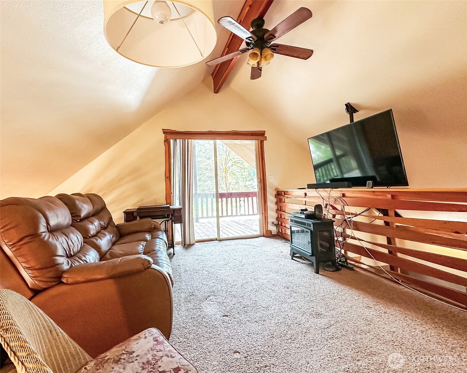 132 Findley Road Morton, WA 98356 - Photo 15 of 28 a living room with furniture and a flat screen tv