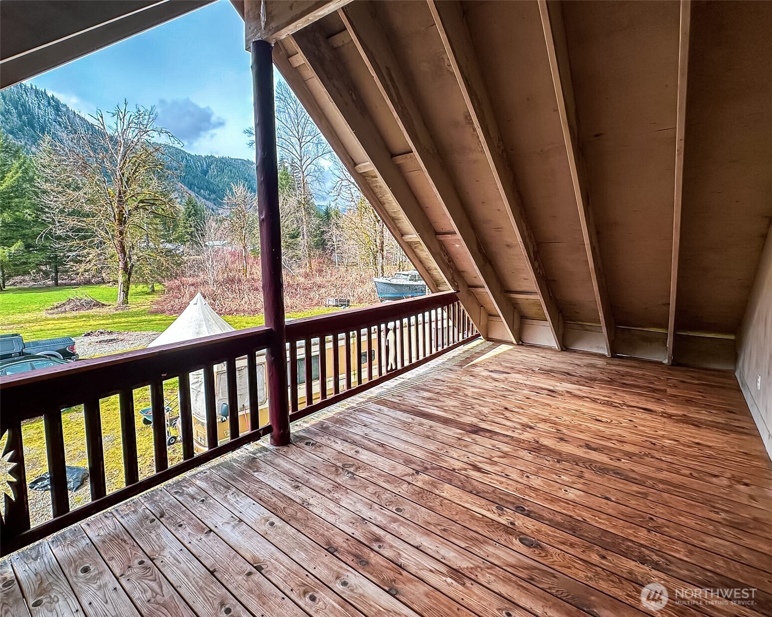 132 Findley Road Morton, WA 98356 - Photo 17 of 28 a view of balcony with wooden floor