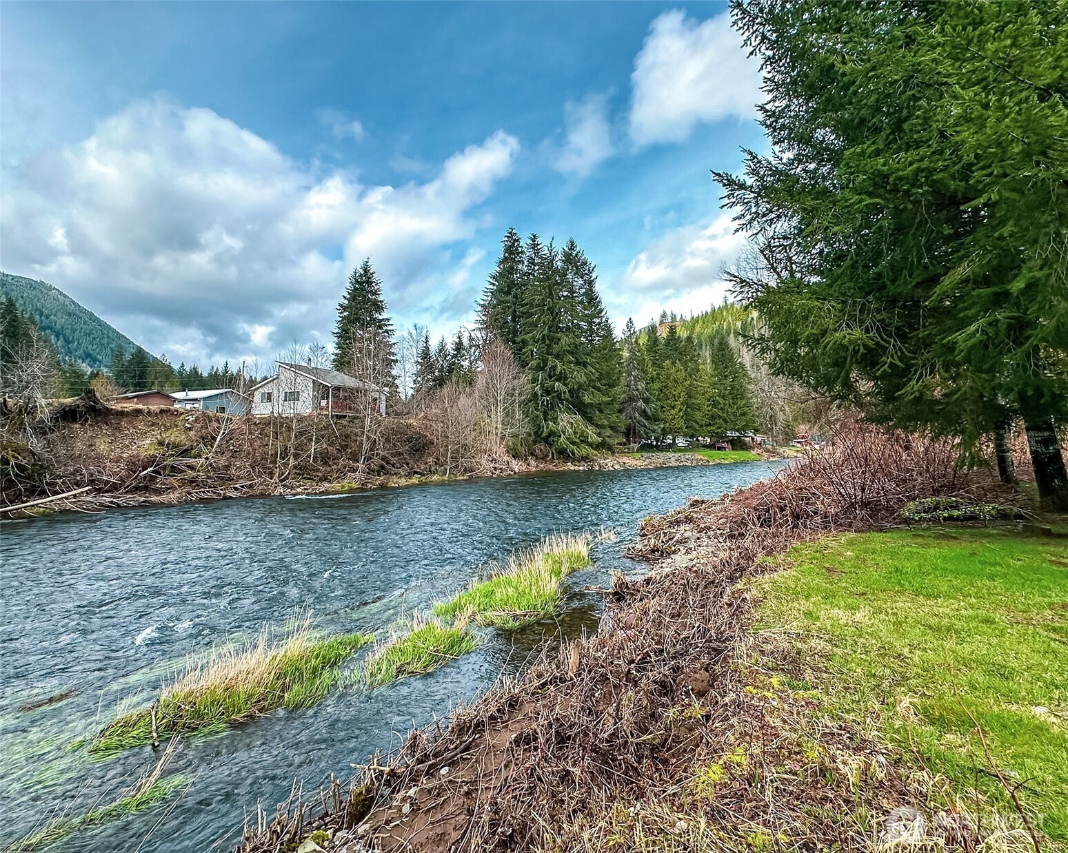 132 Findley Road Morton, WA 98356 - Photo 26 of 28 a view of a lake with houses