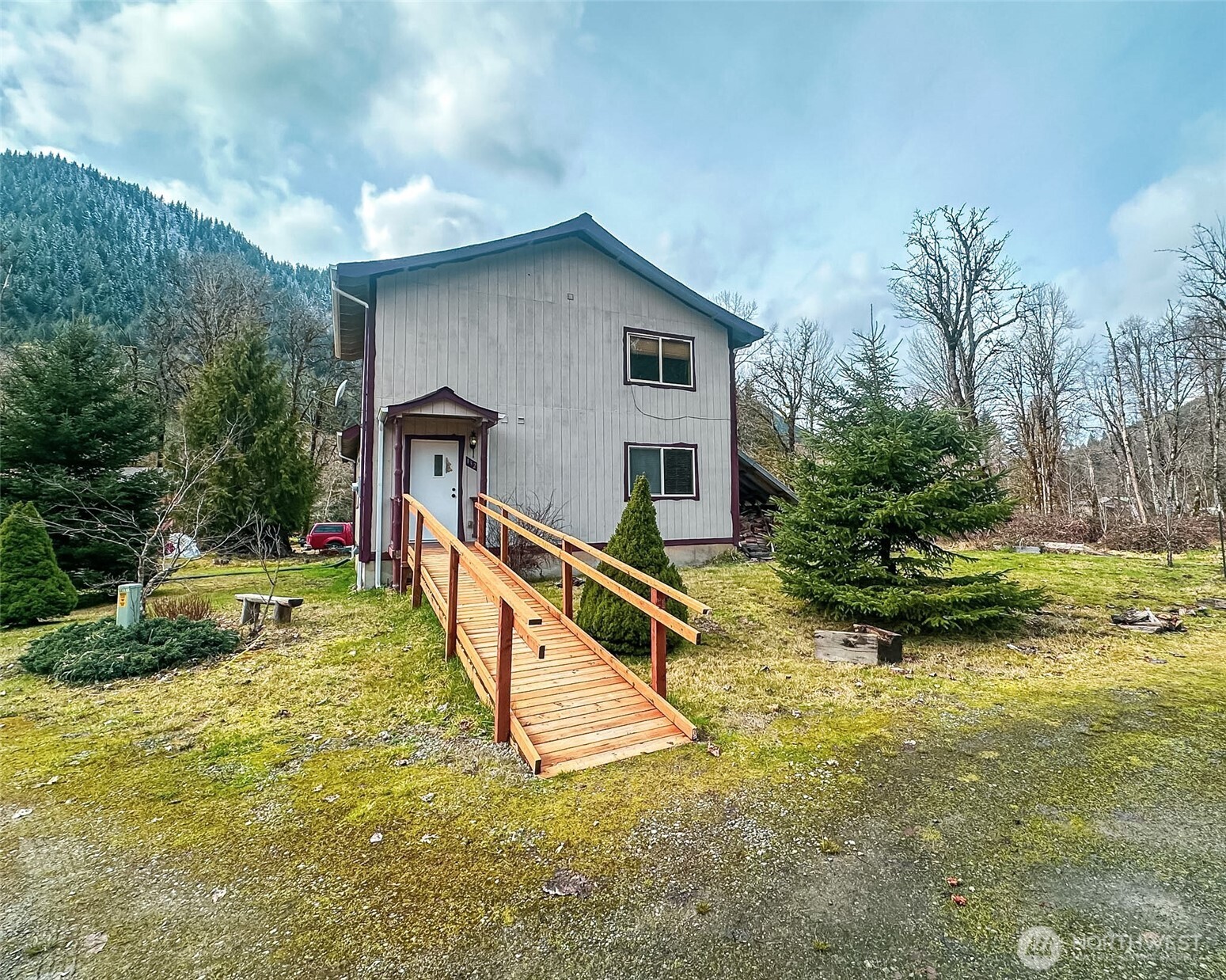 132 Findley Road Morton, WA 98356 - Photo 27 of 28 a view of a house with pool and a yard