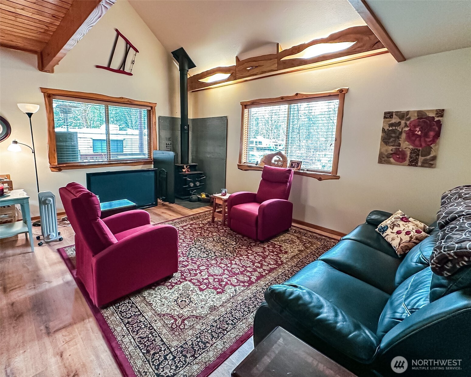 132 Findley Road Morton, WA 98356 - Photo 5 of 28 a living room with furniture a rug and a large window