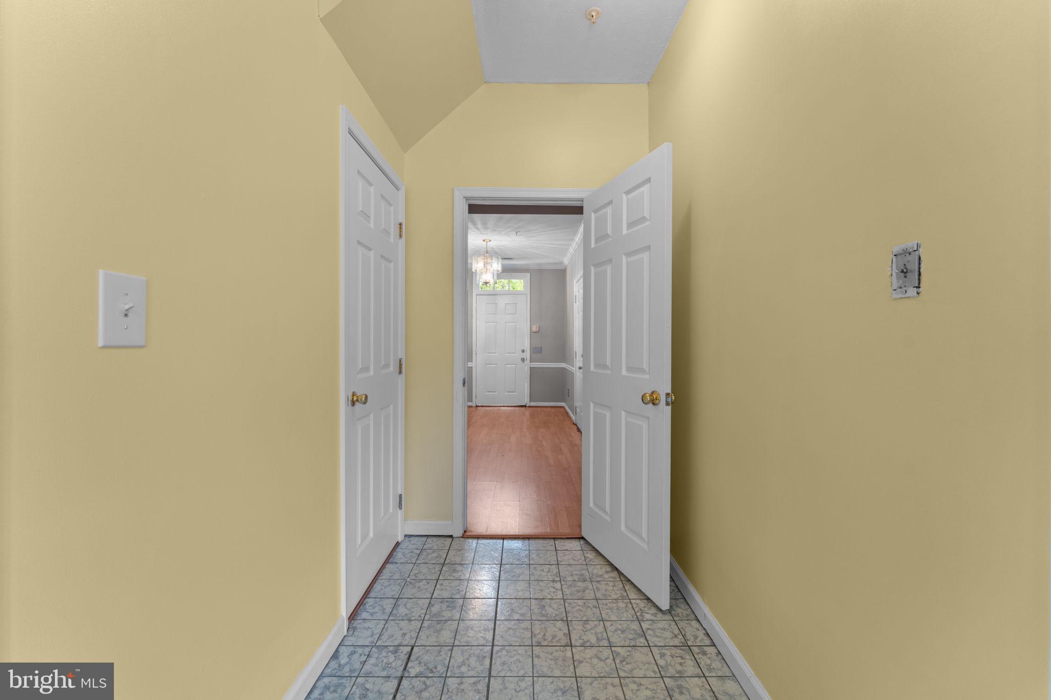 3546 Ellerton Road Bowie, MD 20716 - Photo 56 of 87 Half bath on left, hall to front door